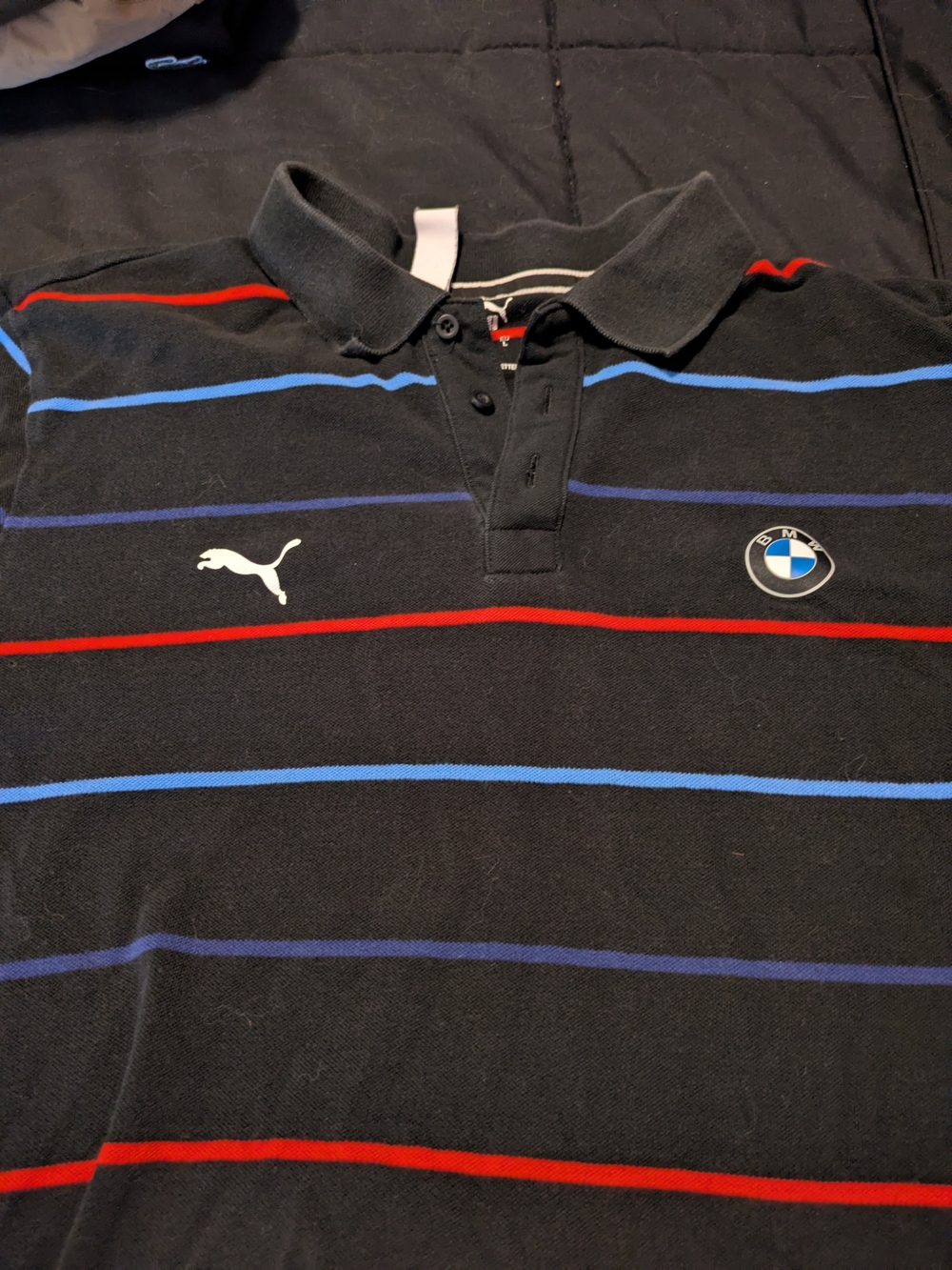 Puma Men’s Black Polo with Red and Blue Stripes